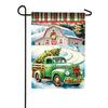 Carson Delivering Christmas Garden Flag